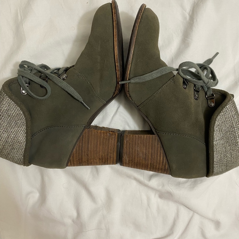 Green heel booties.